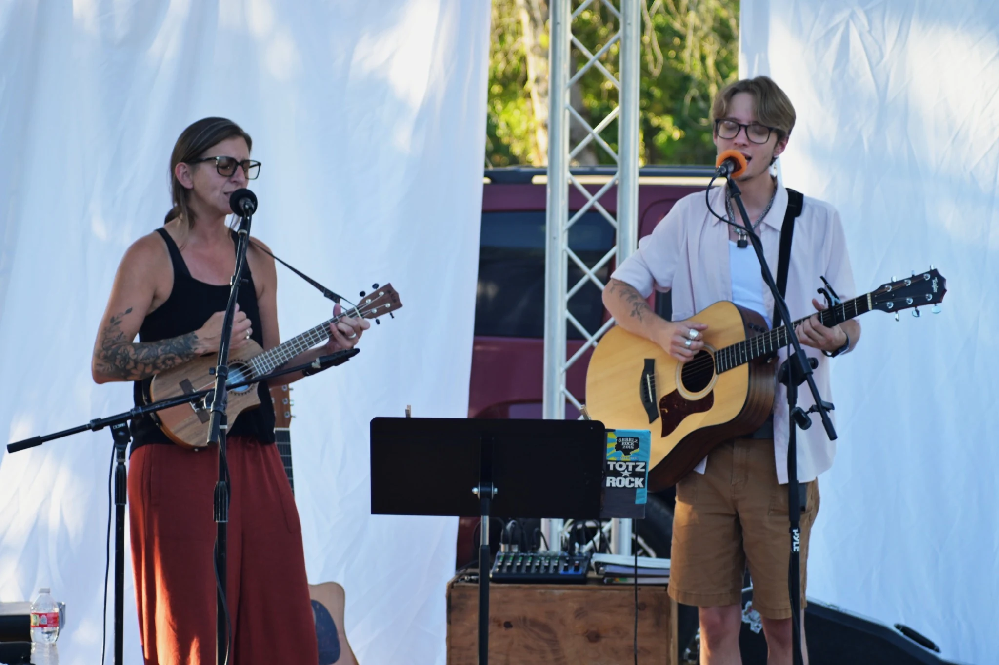 Jen Sennett and Cooper Morris singing together at Smitty's in Veneta
