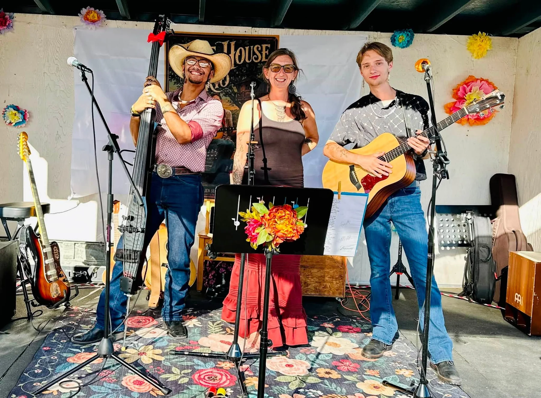 Cooper, Jen, and Dakota posing together after a Tree House Trio performance